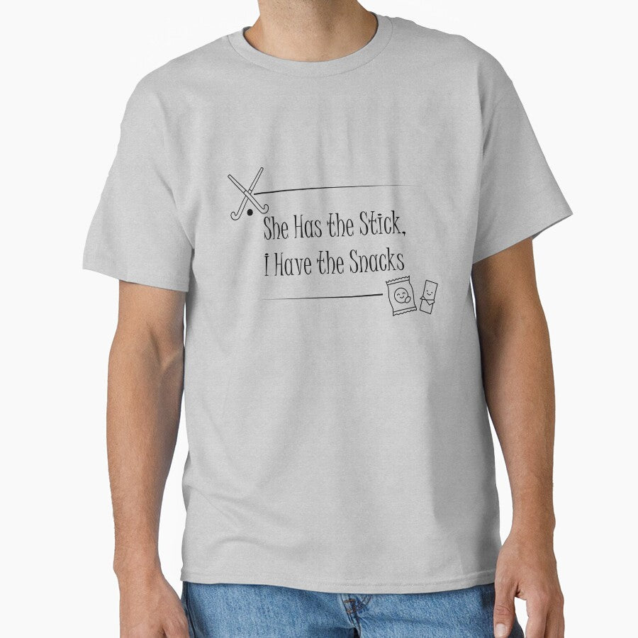 She Has the Stick, I Have the Snacks | Funny Field Hockey Parent by MoqunaDesign