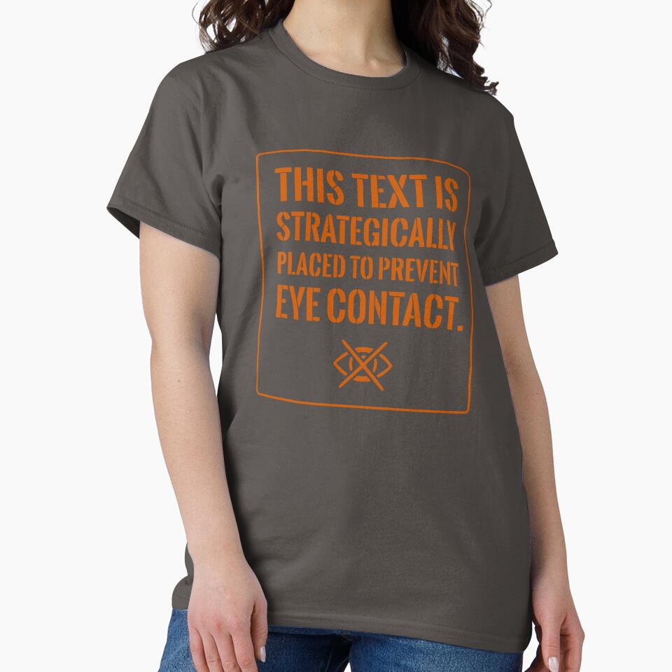 Funny Introvert Shirt: Strategically Placed To Prevent Eye Contact (Orange Text) by RetroNeon