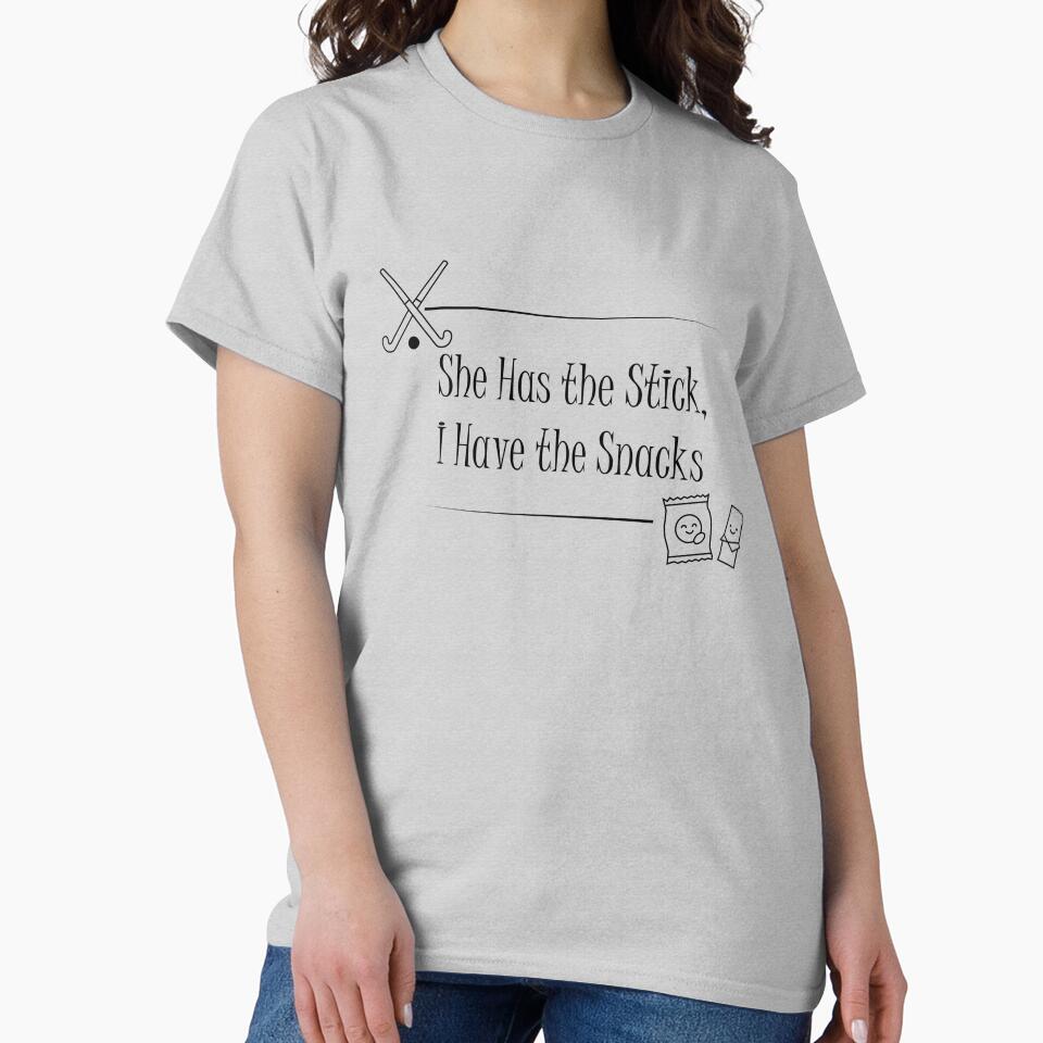 She Has the Stick, I Have the Snacks | Funny Field Hockey Parent by MoqunaDesign