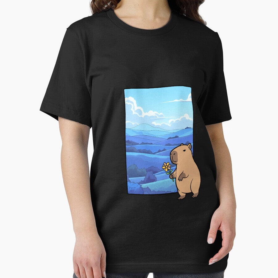 Cute Capybara with Flower – Wholesome Animal Art in Blue Mountain Landscape by 9morethan9®