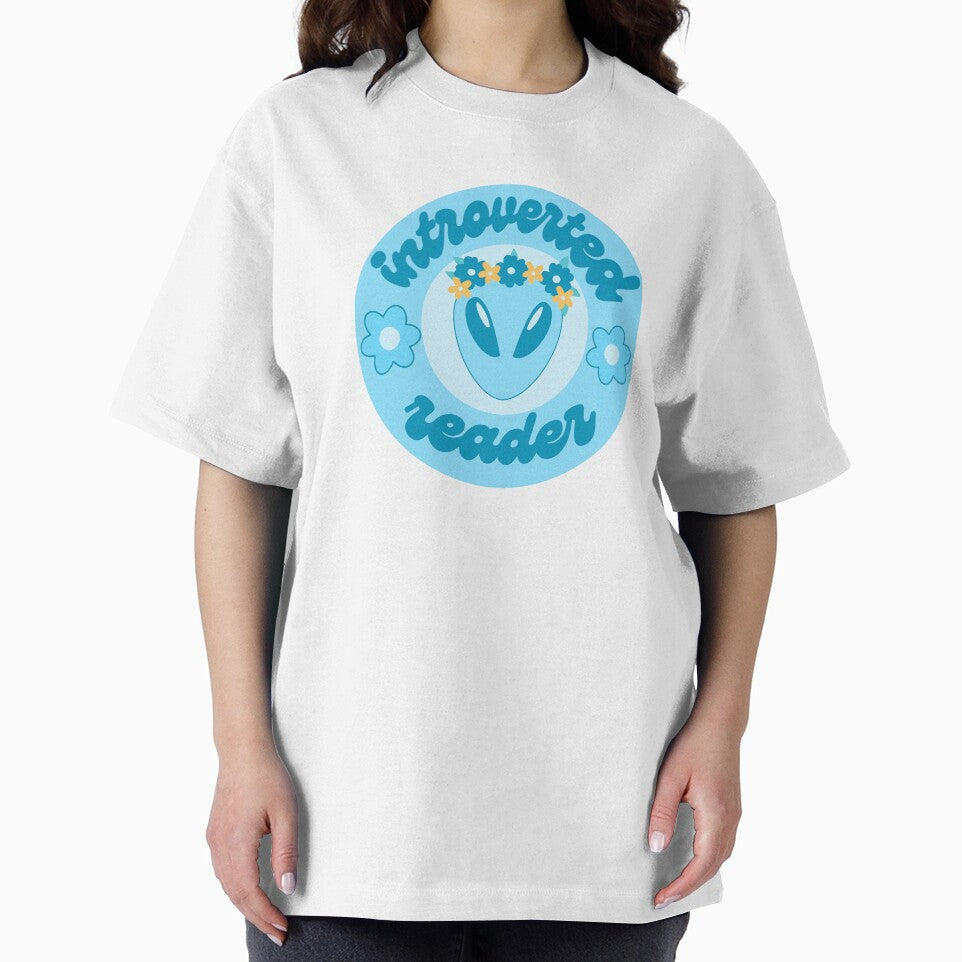 Introverted reader light blue alien by RavenAMarie